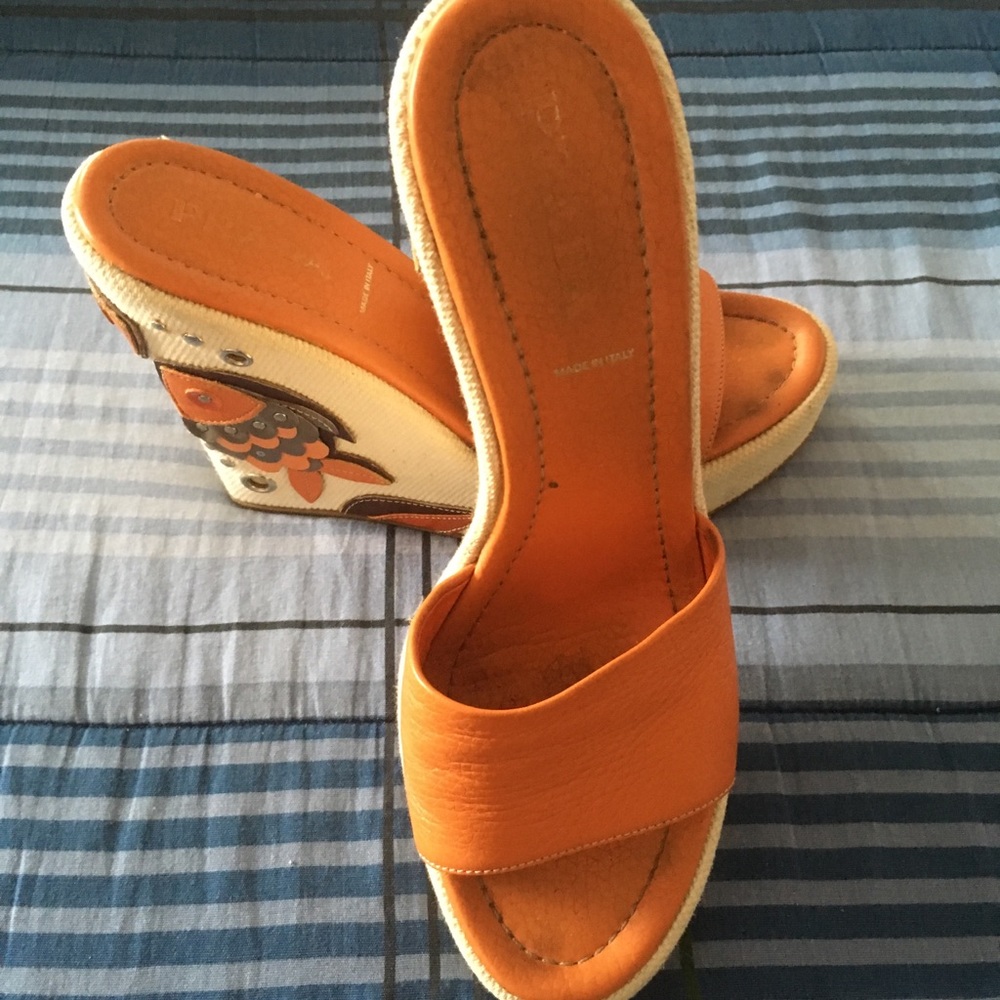 PRADA Orange wedge with appliqué on heel.   Size 9